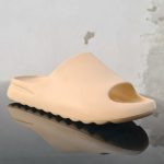 OVYE beige flip-flops